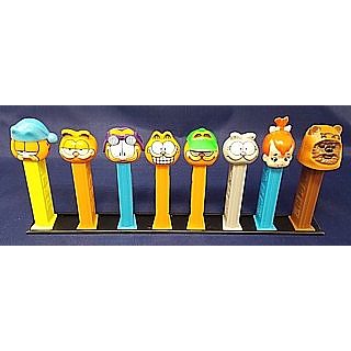 Pez Rails to Hold Pez Dispensers Upright
